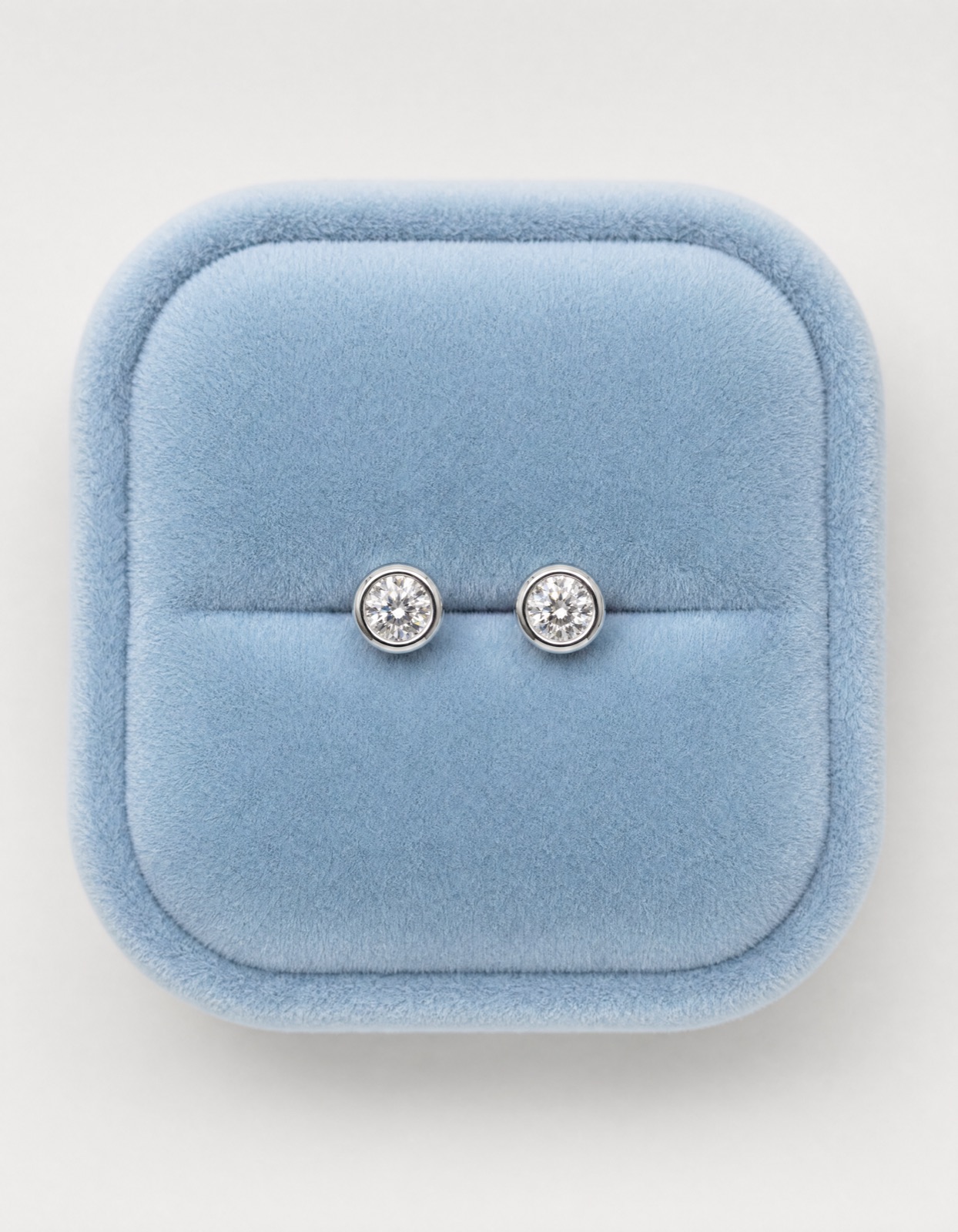 Studs in blue velvet box